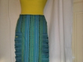 vlněná tyrkysová sukně s bočními průstřihy